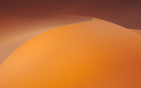 Orange Sand Dunes in the Sahara Desert, Merzouga, Moroccoの写真素材