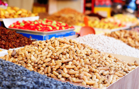 Dried peanuts on a market stall in India. Close-up.の写真素材