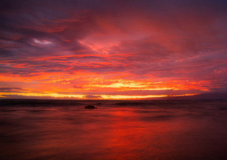 Beautiful seascape at sunset. Dramatic cloudscape.の写真素材