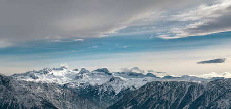 Panoramic view of snow covered mountains in the Alps, Italyの写真素材