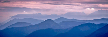 Panoramic view of the mountains at sunset. Beautiful natural landscape.
