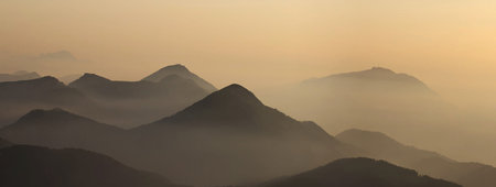 Mountain landscape at sunset, panoramic view of the mountains.