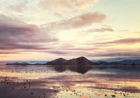 Beautiful sunset at Lake Titicaca, Puno, Peruの写真素材