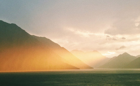 Sunset over Lake Wakatipu, Queenstown, New Zealandの写真素材