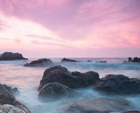 Beautiful seascape with long exposure of sea and rock.の写真素材
