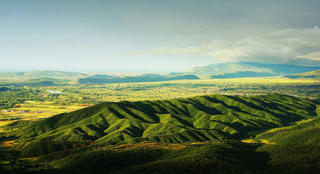 Landscape of green mountains and blue sky with clouds, Thailand.の写真素材
