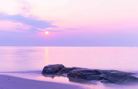 Tropical beach and sea at sunset time for travel and vacationの写真素材