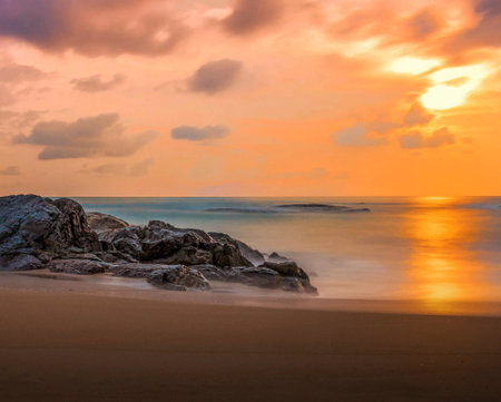 Beautiful sunset on the beach, Sri Lanka. Long exposure shot.の写真素材