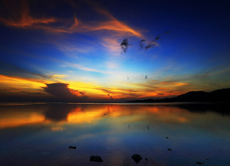 Beautiful sunset at the beach in Phuket, Thailand.