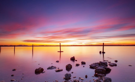Sunset at the beach in the evening. Beautiful natural landscape.の写真素材