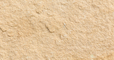 Close up of sandstone texture for background. High resolution photo.
