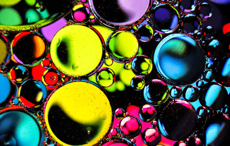 Colorful abstract background of oil drops in water. Macro shot.の写真素材
