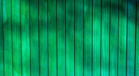 Wooden planks painted in green color. Wood background and textureの写真素材