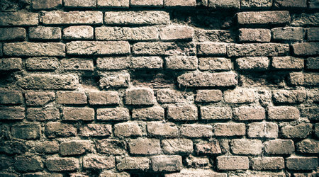 Old brick wall texture background. Vintage tone filter effect color style.の写真素材