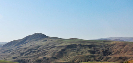 Mongolian steppe in the morning light. Panorama
