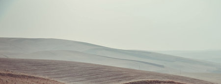 Panoramic view of the Tuscany hills in winter.の写真素材