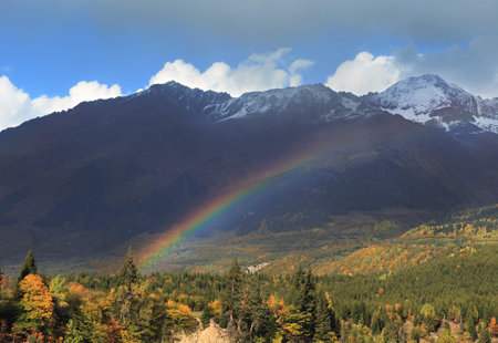 Rainbow in the mountains. Autumn landscape. Russia, Siberia, Altai mountains.の写真素材
