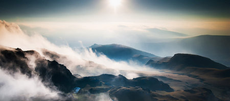 Mountain landscape with fog in the morning. Panoramic viewの写真素材