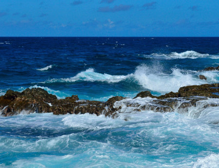 Coast of the island of Mauritius with waves crashing on the rocksの写真素材