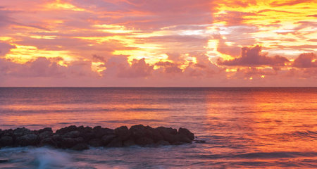 Beautiful sunset on the beach at Seychelles, Maheの写真素材