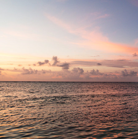 Beautiful sunset over the sea in the tropics. Maldives