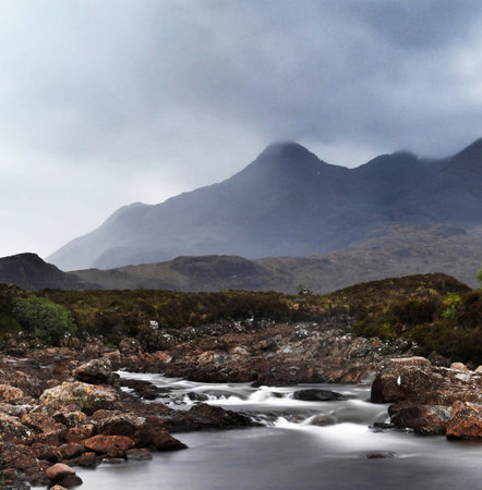 Long exposure of a mountain river flowing through a rocky area in the Scottish Highlandsの写真素材