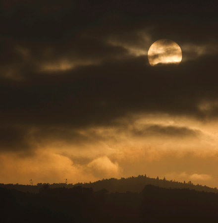 The full moon over the mountains in the evening, natural landscape backgroundの写真素材