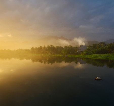 Beautiful landscape view of lake and mountain at sunrise, Thailand.