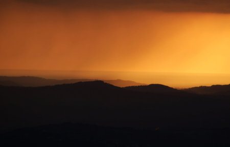 Sunset in the mountains. Sunset in the mountains. Sunset in the mountains.の写真素材