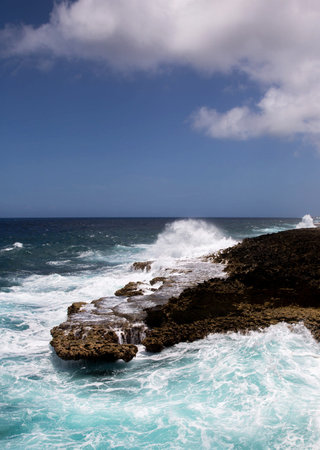 Waves breaking on the rocks in the Atlantic Ocean, Tenerife, Canary Islandsの写真素材