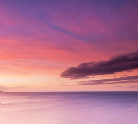 Beautiful sunset on the beach. Nature composition. Sunset over the sea.の写真素材
