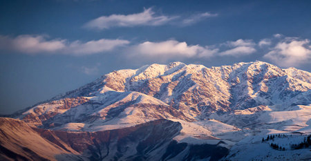 Mountains covered with snow at sunset. Caucasus Mountains, Georgia, region Gudauri.