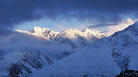 Snowy mountains at sunset, Annapurna Circuit Trek, Nepalの写真素材