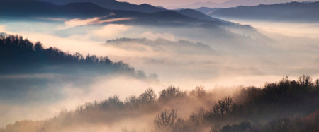 Panoramic view of foggy morning in the Carpathian mountainsの写真素材