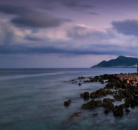 Beautiful seascape with rocks and sea in the evening.の写真素材
