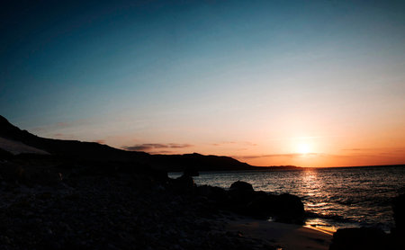 Beautiful sunset at the beach on the island of Crete, Greeceの写真素材