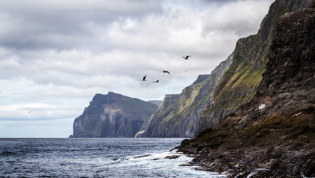 Cliffs of Moher in County Clare, Ireland. Cloudy day.の写真素材