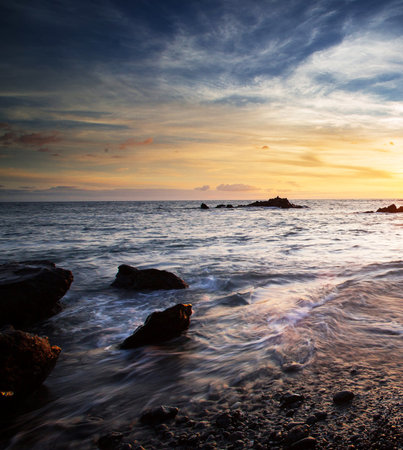 Beautiful seascape at sunset. Nature composition. Long exposure.の写真素材