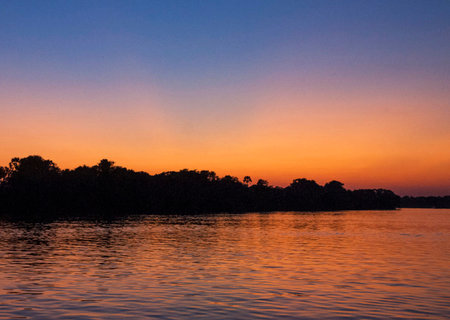 Sunset on the Mekong river in Laos, Southeast Asia.の写真素材