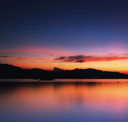 Beautiful sunset on the lake in the mountains. Landscape.の写真素材