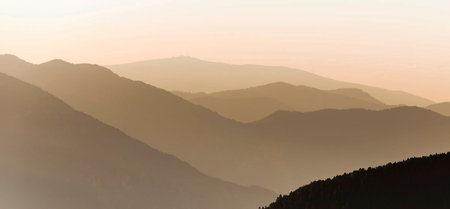Sunrise in the mountains. Panoramic view of the mountains.の写真素材