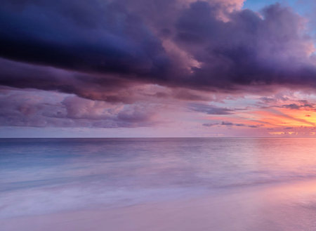 Beautiful seascape. Sunset over the sea. Dramatic sky.