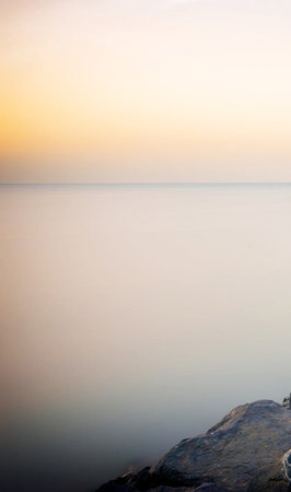 beautiful sunset over the sea, natural background, long exposure photoの写真素材