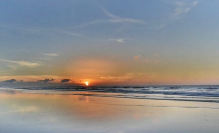 Sunset on the beach in Bali, Indonesia. Panoramic view.の写真素材