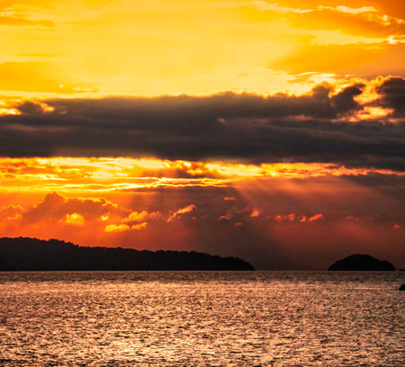 Beautiful sunset over the sea with dramatic sky and clouds, Thailand