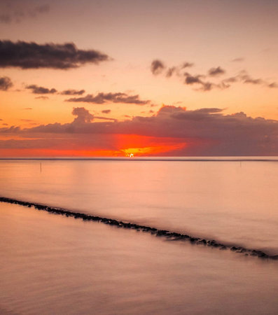 Beautiful sunset over the sea in the tropics, Maldivesの写真素材