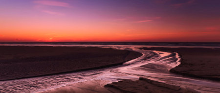 Beautiful sunset on the beach in the evening, long exposure.