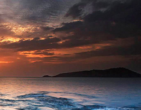 Sunset on the beach of Phuket,Thailand.の写真素材