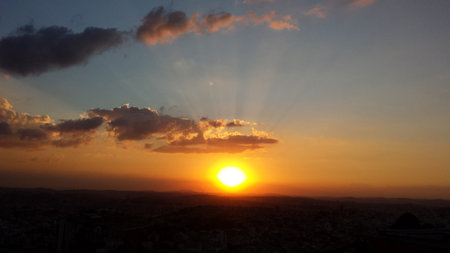 Sunset over the city of Jerusalem, Israel. The sun sets over the city.の写真素材