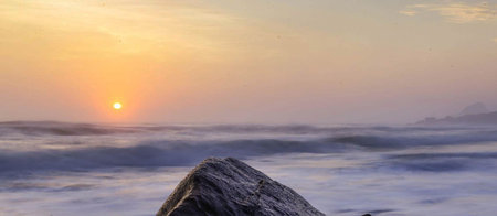 Beautiful seascape with sunrise over sea. Panorama.の写真素材